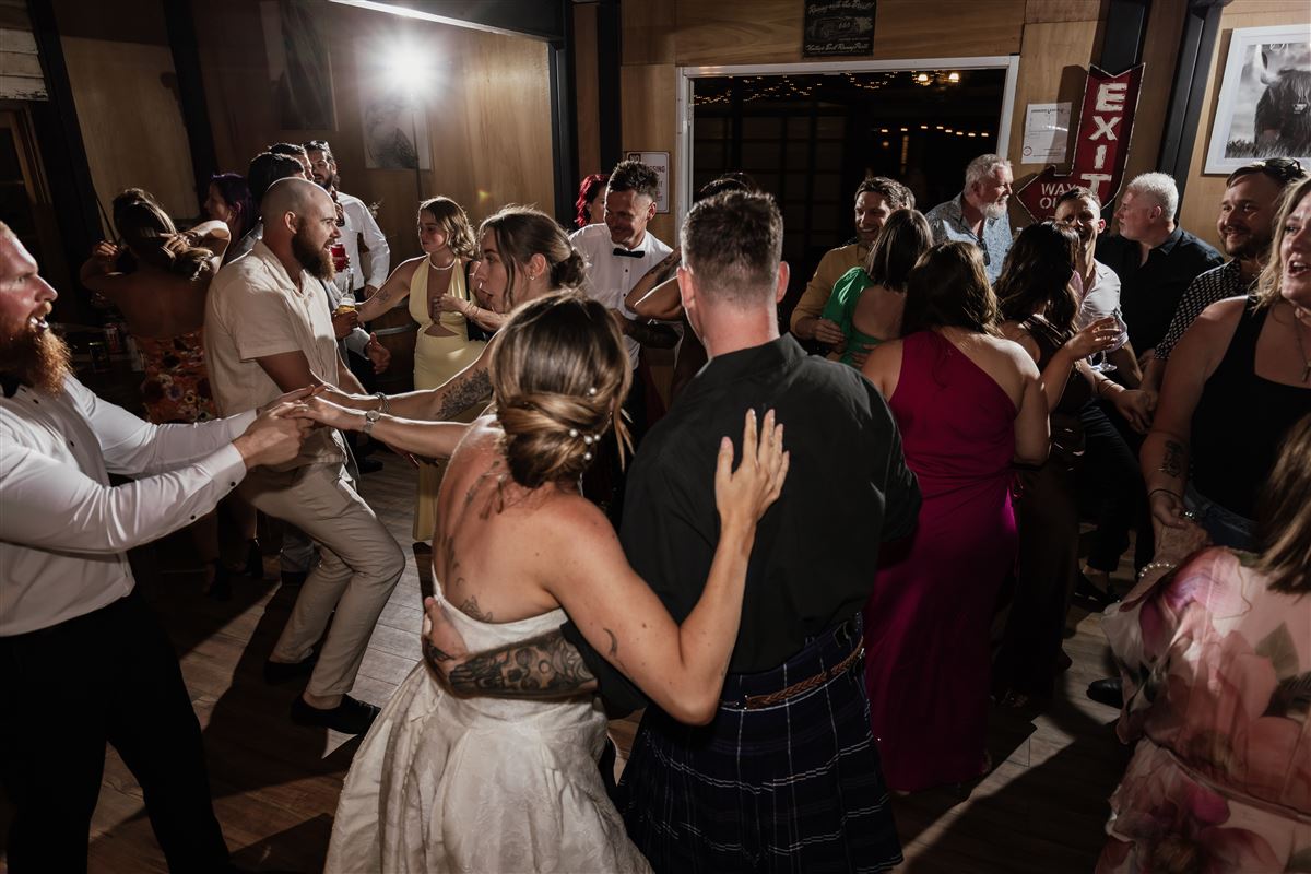 Guests packing the dancefloor as the bride dances